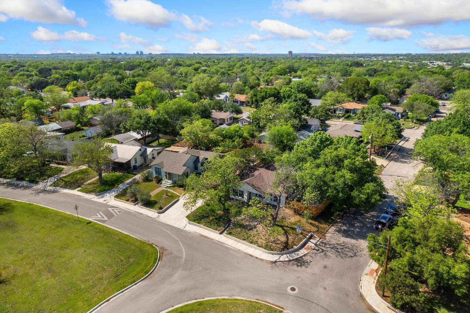 long asphalt driveway in North Texas